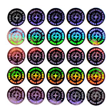 Okrągły srebrny hologram o średnicy 11mm z napisami: VOID i protect
